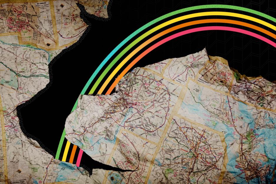 illustration of a ripped crinkled map with a rainbow coming out of it