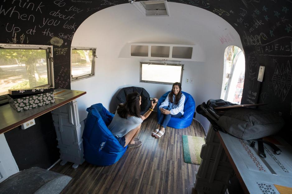 Students in an airstream recording a video