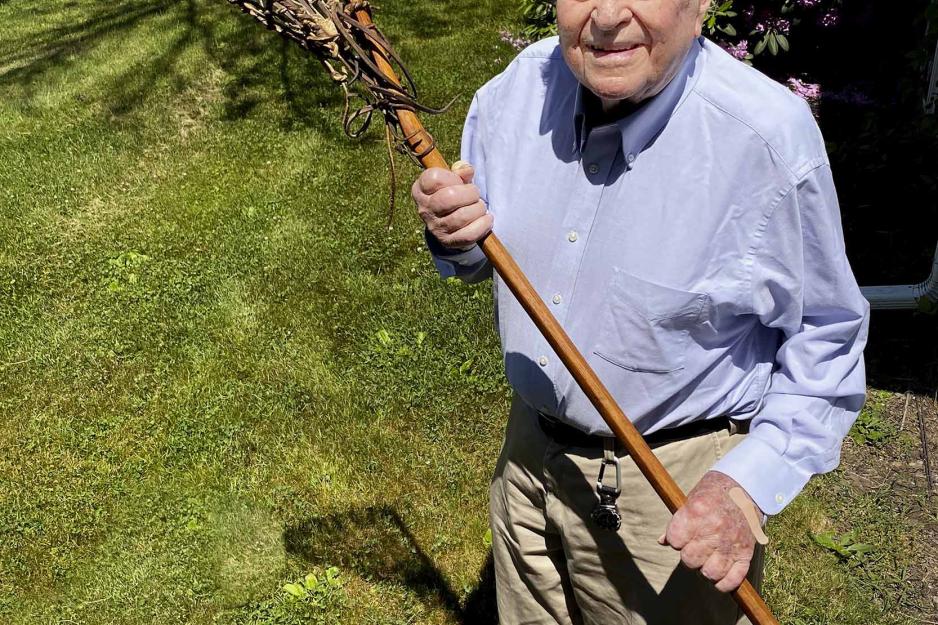 Bryson Ainsley holding a Lacrosse stick