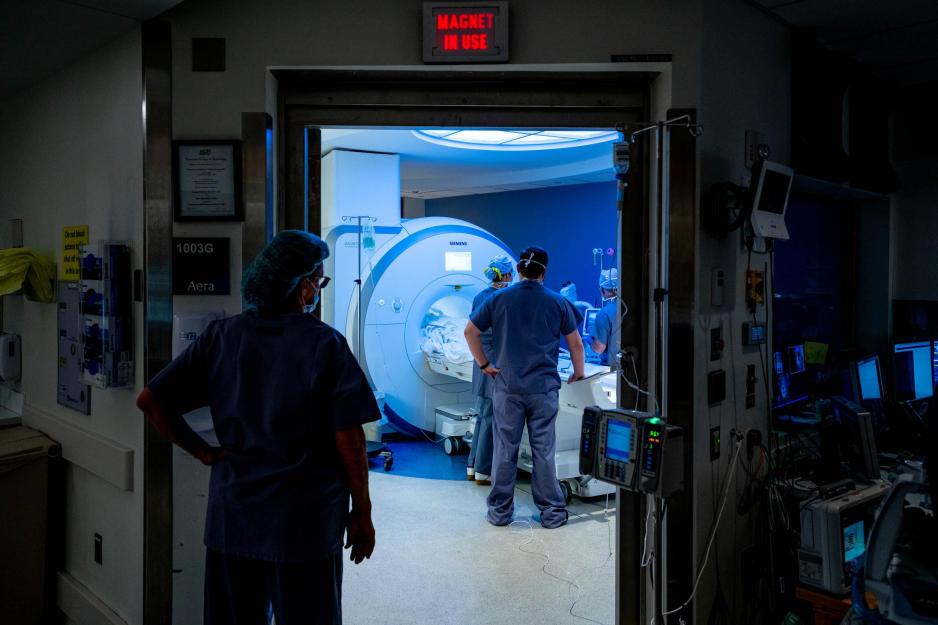 medical professionals getting a patient ready for a MRI