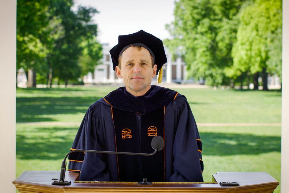 President Jim Ryan standing at a podium under the Rotunda's porch