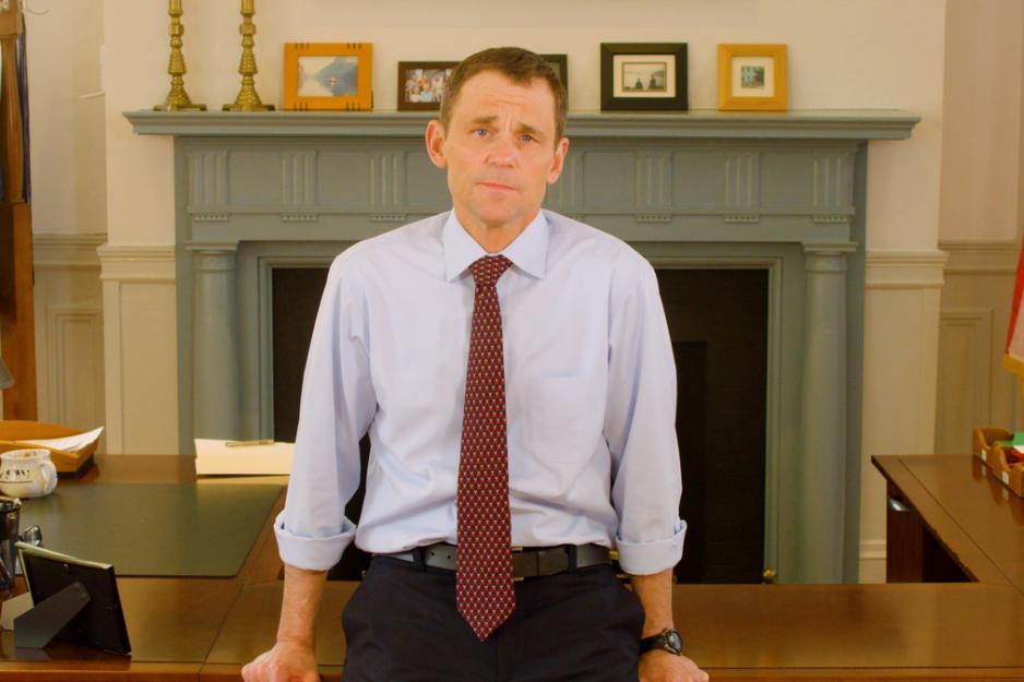 President Jim Ryan sitting on his desk