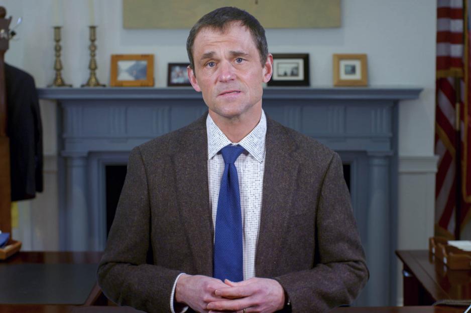 President Jim Ryan in his office speaking during a video announcement