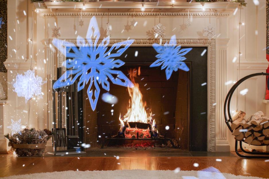 Fireplace with fake snow flakes falling down