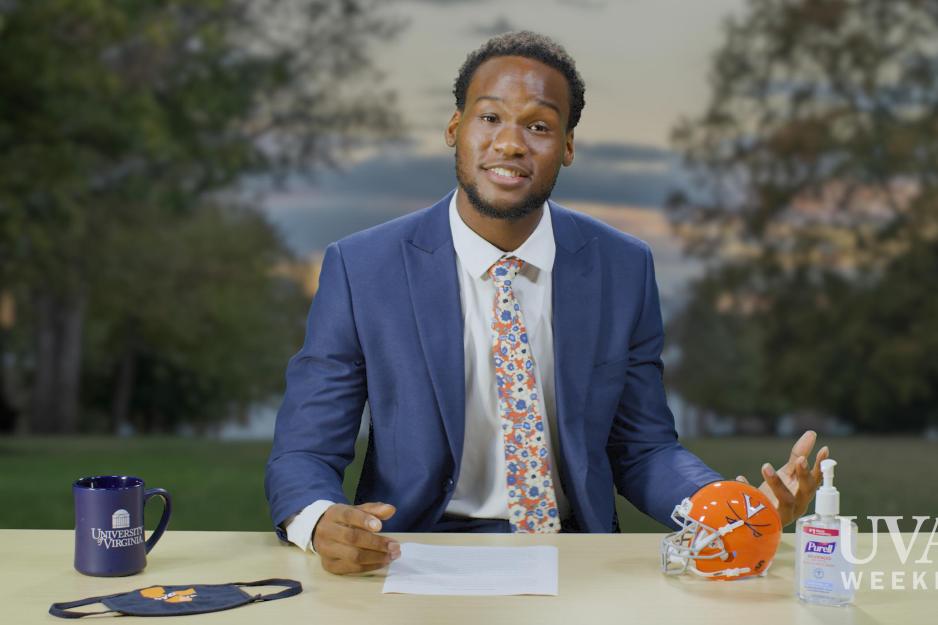 Student sitting at a reporter desk