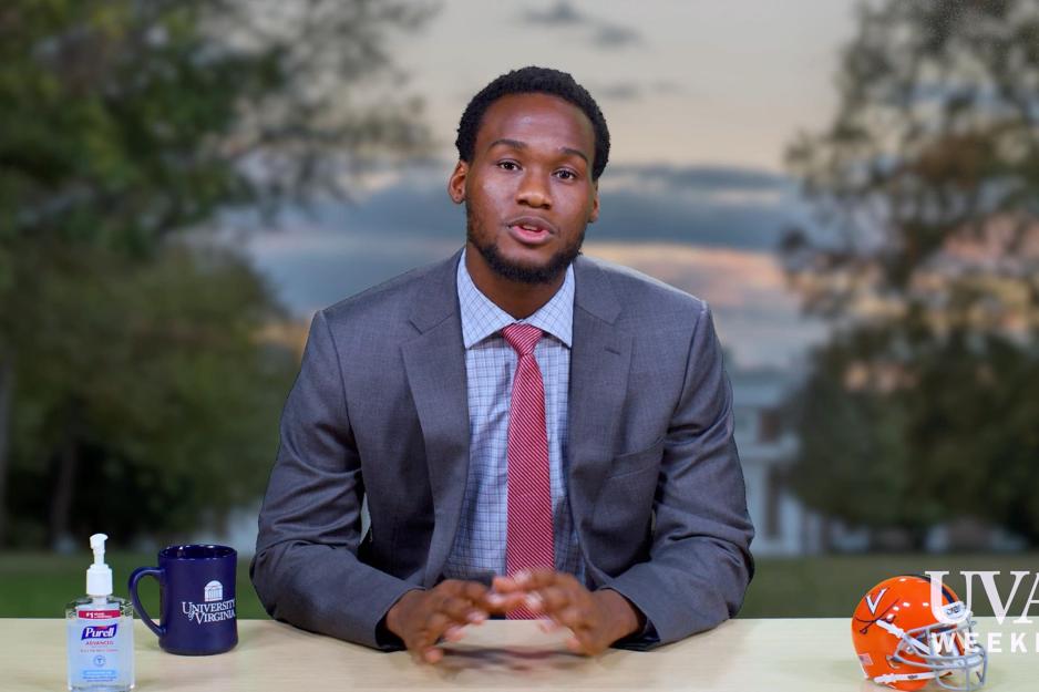 Student sitting at a reporter desk