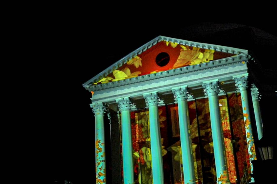 Town hall building with flowers projected on the building