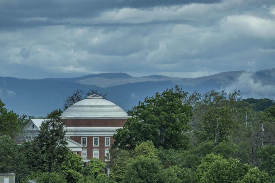 the Side of the Rotunda from the distance with trees blocking some of the view