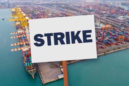 An aerial view of the port with a strike sign placed over it.