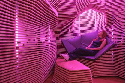 Catherine Kazel sitting in a reflection space in Student Health and Wellness at UVA