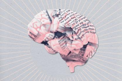 A human brain overlaid with crumbled up papers