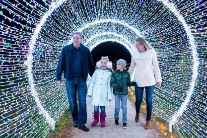 Family surrounded by a white light tunnel