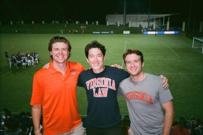 Portrait in front of soccer field of Paul Patton, Peter Lee Hamilton, and Chris Hamborksy 