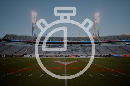 Illustration of a stopwatch overlaying the field in Scott Stadium