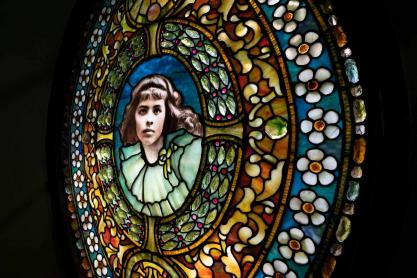 Eugenie Moore Faulkner's face in a Tiffany window.