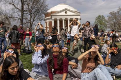 Students viewing the eclipse in front of the Rotunda