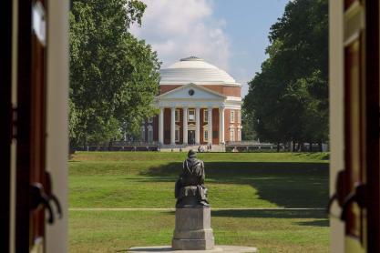 A view through the doors of Old Cabell Hall across the Lawn to the Rotunda