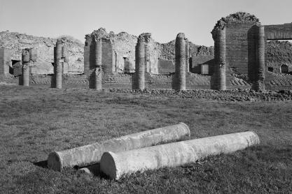 Broken pillars and wall in pompeii, black and white image