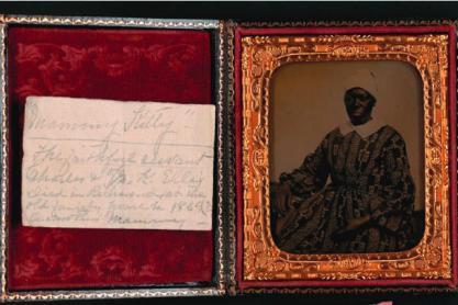 Hand written note and picture of an African American woman, Mammy Kitty, in a box