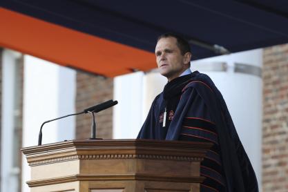 President Ryan speaking at a podium after his inauguration 