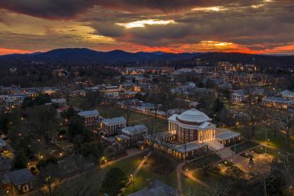Aerial view of the Rotunda an Charlottesville at dusk with lights on