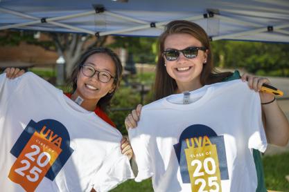 Students holding a UVA Class of 2025 tshirts
