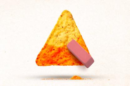 illustration of a rubber eraser removing the color from a corn chip snack.