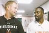 UVA head football coach Bronco Mendenhall, left, calls Ahmad Hawkins, right, “just a positive presence” around the Cavalier football team. 