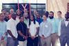Members of the football team’s 2010 entering class pose for photos at Final Exercises in 2014. 
