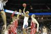 Mamadi Diakite rises above Oklahoma players during Virginia’s 63-51 winning game in the Round of 32.