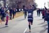 Chris Farley crosses the finish line of a marathon last December that family, friends and employees organized just for him. 