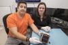 Engineering students Trace LaCour, Erin Puckette, and their student colleagues have dedicated “many, many hours” to preparing their CubeSat for space. 
