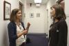 Nursing doctoral student Maggie Spriggs, left, chats with mentor Reagan Thompson, a fellow nurse practitioner at the Primary Care Center, part of UVA Family Medicine. 