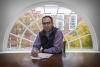 Kerem Cosar, a professor of economics specializing in international trade