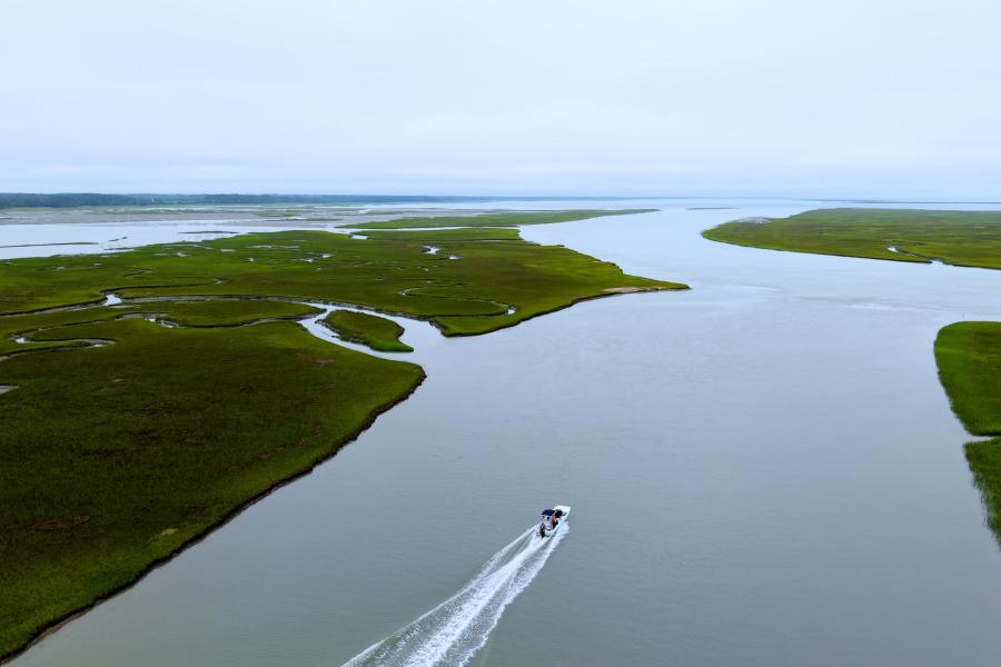 a power boat cruising the Virginia coastline