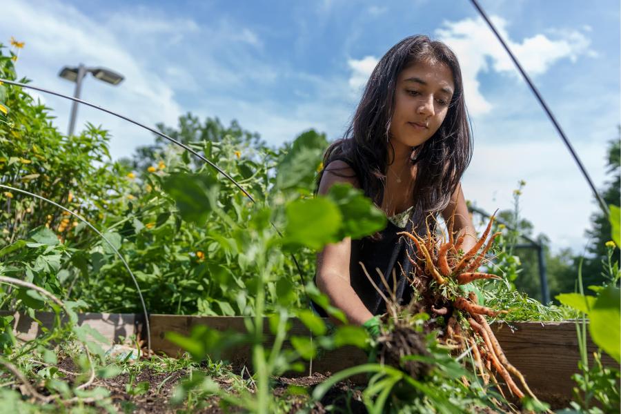 Portrait of a girl doing some gardening.