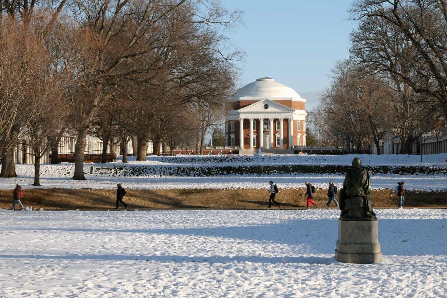 A distant view of the Rotunda with snow on the Lawn