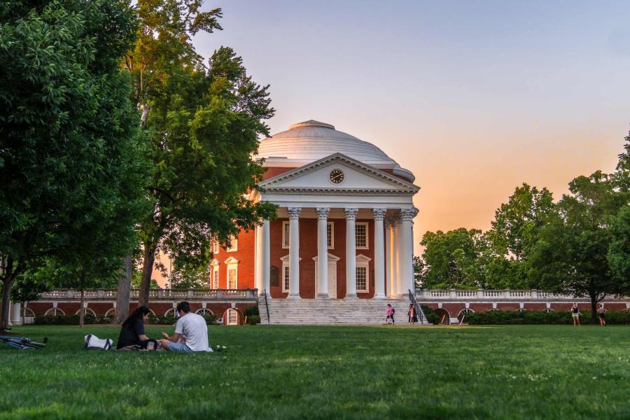 Student sitting on the Lawn in front of the UVA Rotunda