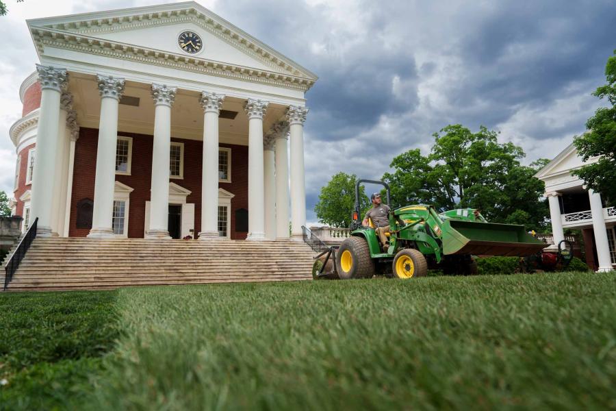 Image of the Rotunda shot from the lawn with a John Deere tracker in the frame