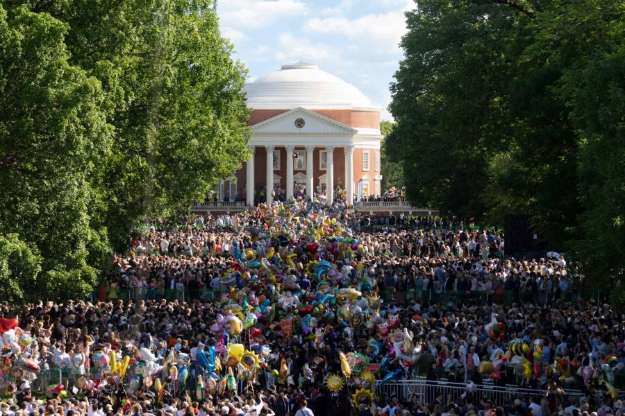 Looking down the Lawn towards the Rotunda at the sea of 2025 graduating students processing down the Lawn