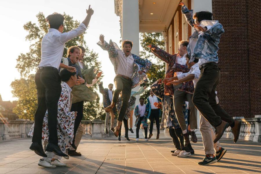 members of UVA Hullabahoos dancing and performing on grounds