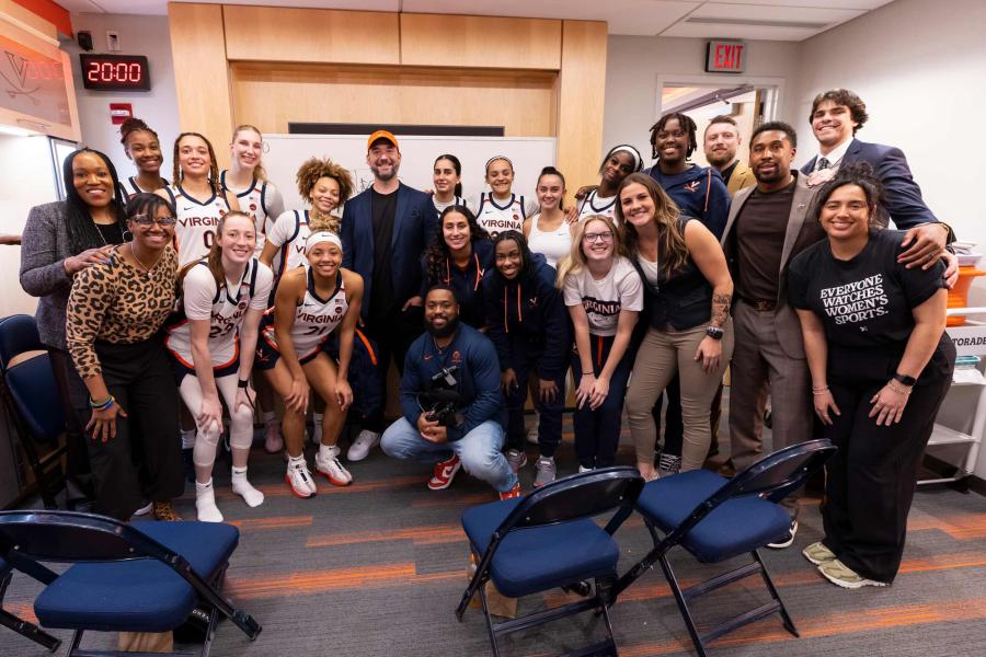 Alumnus Alexis Ohanian, center in orange hat, is a major supporter of the UVA women’s basketball program. 