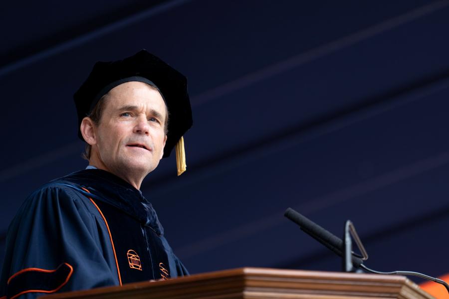 UVA President Jim Ryan looking out at the graduating class of 2025
