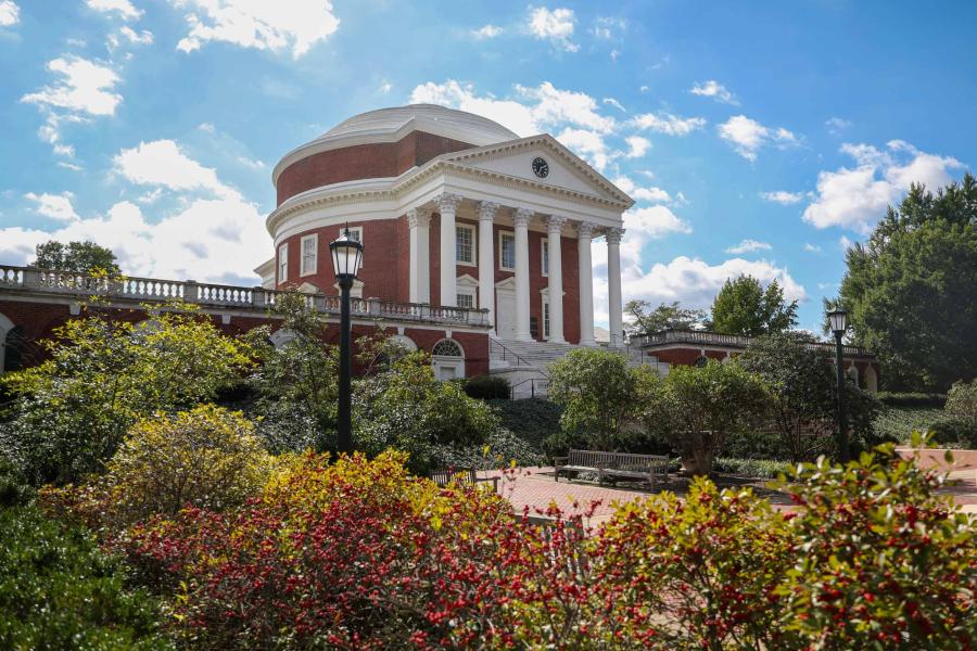 looking up at the UVA Rotunda and front landscaping on a bright afternoon.