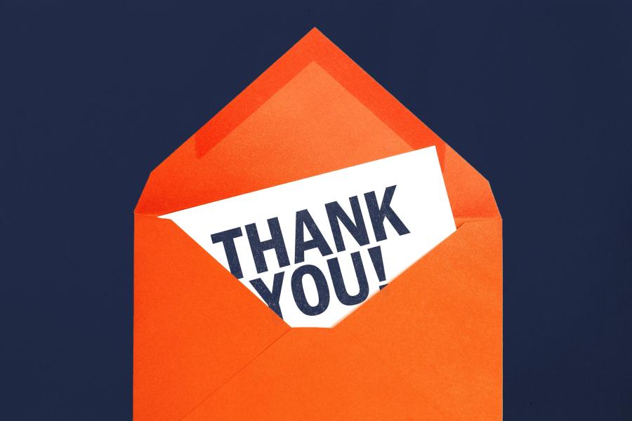 Illustration of a Thank You note coming out of an envelope