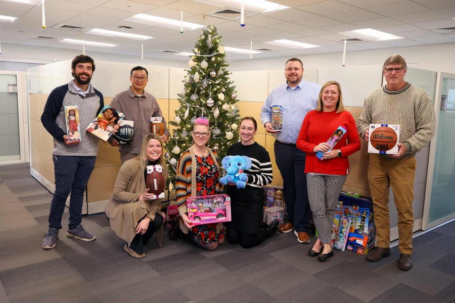 Group portrait of a team from Facilities Management Finance – from left, Steven Roberts, Shawn Gu, Blake Watson, Sonya George, Hunter Howell, Jason Davis, Kelli Craddock and Paul Perkins 