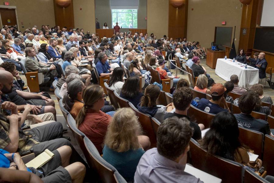 More than 150 UVA students, faculty, alumni and community members fill Nau Hall’s auditorium to listen to a panel discussion on how to have difficult, but productive conversations about Israel and Palestine.