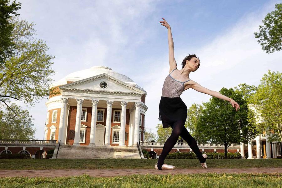 Molly Yeo dances in front of the Rotunda