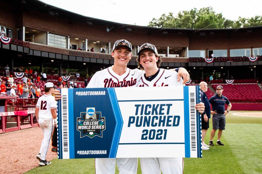 Zack, left, and Jake Gelof holding a Ticket Punched sign 