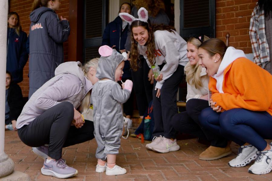 Trick or treaters interact with lawnies